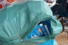 Số khẩu trang bị tạm giữ. (Ảnh: Thanh Tân/TTXVN)