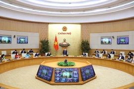 Phó Thủ tướng Vũ Đức Đam chủ trì cuộc họp. (Ảnh: Văn Điệp/TTXVN)