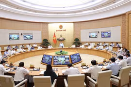 Quang cảnh hội nghị tại điểm cầu Chính phủ. (Ảnh: Dương Giang/TTXVN)