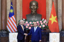 Chủ tịch nước Nguyễn Xuân Phúc tiếp Thủ tướng Malaysia Ismail Sabri Yaakob thăm chính thức Việt Nam. (Ảnh: Thống Nhất/TTXVN)