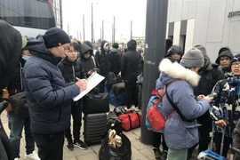 Hàng trăm người ở Kharkov, Ukraine đã được sơ tán sang các nước lân cận. (Nguồn: TTXVN phát)