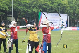 Vận động viên bắn cung thi đấu. (Ảnh: Vũ Sinh/TTXVN)