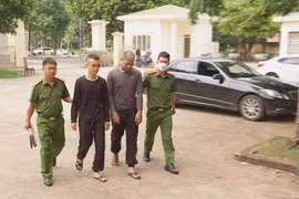 Trần Nam Giang và Trần Văn Hiệp bị lực lượng chức năng bắt giữ. (Nguồn: Lao Động)