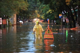 Cảnh ngập lụt ở Hà Nội khi có mưa lớn. (Nguồn: TTXVN)