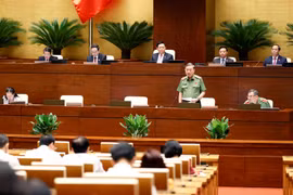 Đại tướng Tô Lâm Bộ trưởng Bộ Công an trả lời chất vấn. (Ảnh: Doãn Tấn/TTXVN)