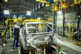 Hoạt động sản xuất tại nhà máy ôtô Hyundai Thành Công. (Ảnh: Hoàng Hùng/TTXVN)