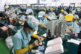 Sản xuất linh kiện điện tử. (Nguồn: TTXVN)