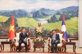 Tổng Bí thư, Chủ tịch nước Lào Thongloun Sisoulith tiếp ông Võ Văn Thưởng, Ủy viên Bộ Chính trị, Thường trực Ban Bí thư. (Ảnh: Phạm Kiên/TTXVN)
