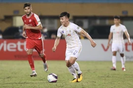 Quang Hải chơi trận cuối cho Hà Nội FC tại V-League ngày 4/4. (Ảnh: Minh Quyết/TTXVN)