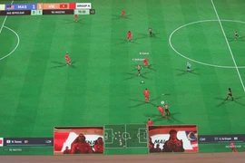 Một game đấu giữa Đội tuyển Việt Nam và Malaysia ở nội dung FIFA Online 4. (Ảnh: Minh Đông/TTXVN)