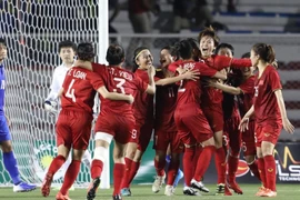 Tiền vệ Tuyết Dung thay mặt đội tuyển nữ chúc đội U22 Việt Nam cũng sẽ vô địch SEA Games 30. (Ảnh: Vietnam+)