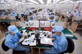 Việt Nam đang đẩy mạnh công nghiệp hóa, hiện đại hóa và hội nhập quốc tế. (Ảnh: Danh Lam/TTXVN)