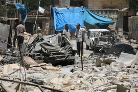 Cảnh đổ nát tại phía bắc thành phố Aleppo sau các cuộc giao tranh. (Nguồn: AFP/TTXVN)