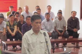 Bị cáo Vũ Bình Nguyên nghe toà tuyên án. (Ảnh: Vũ Hà/TTXVN)