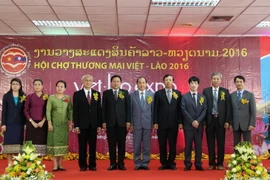 Thứ trưởng Bộ Công Thương Nguyễn Cẩm Tú dự lễ khai mạc. (Ảnh: Phạm Kiên/Vietnam+)