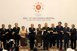 Các đại biểu dự Hội nghị chụp ảnh chung. (Ảnh: Phạm Kiên/TTXVN)