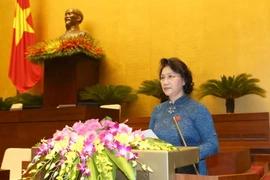 Chủ tịch Quốc hội Khóa XIII Nguyễn Thị Kim Ngân đọc diễn văn khai mạc. (Ảnh Trọng Đức/TTXVN) 