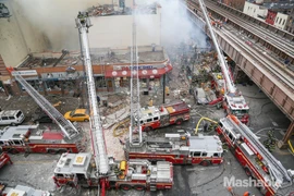Chùm ảnh về vụ nổ khí gas gây sập nhà tại New York