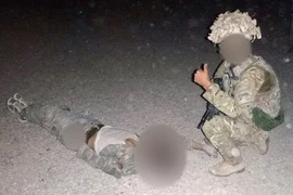 Anh điều tra vụ binh sỹ chụp ảnh bên xác chiến binh Taliban