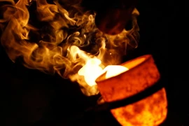 Giá vàng thế giới rơi xuống mức thấp nhất trong hơn bảy tháng