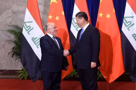 Thủ tướng Iraq Haider al-Abadi và Chủ tịch Trung Quốc Tập Cận Bình. (Nguồn: AFP/TTXVN)