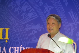 Bộ trưởng Bộ Tư pháp Hà Hùng Cường phát biểu tại Hội nghị. (Ảnh: Hoàng Hải/TTXVN)