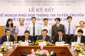 TTXVN ký Kế hoạch phối hợp thông tin tuyên truyền về tài chính