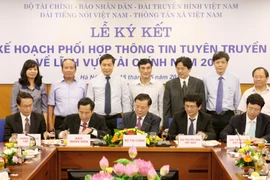 TTXVN ký Kế hoạch phối hợp thông tin tuyên truyền về tài chính