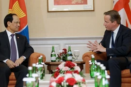 Tổng Thư ký Lê Lương Minh và Thủ tướng Cameron trong cuộc gặp ngày 27/7. (Nguồn: AP)