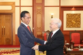 Tổng Bí thư Nguyễn Phú Trọng tiếp Tổng thống Cộng hòa Indonesia Joko Widodo thăm cấp Nhà nước Việt Nam và tham dự Hội nghị Diễn đàn Kinh tế thế giới về ASEAN 2018. (Ảnh: Trí Dũng/TTXVN)