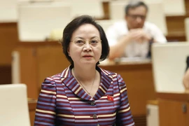 Bộ trưởng Bộ Nội vụ Phạm Thị Thanh Trà trả lời chất vấn. (Ảnh: Doãn Tấn/TTXVN)