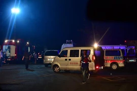 Nhân viên cứu hộ tới hiện trường vụ nổ nhà máy khí đốt tại thị trấn Nghĩa Mã, Hà Nam, Trung Quốc ngày 20/7. (Ảnh: THX/TTXVN)