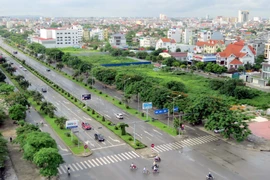 Bộ Tài nguyên-Môi trường và Bộ Tư pháp vừa ban hành Thông tư liên tịch số 09/2016/TTLT-BTP-BTNMT hướng dẫn việc đăng ký thế chấp quyền sử dụng đất. (Nguồn: TTXVN)