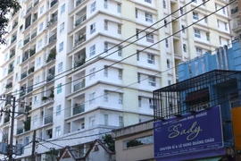 Chung cư Khang Gia, quận Tân Phú xây dựng sai thiết kế bị người dân khiếu nại về cấp giấy chủ quyền căn hộ. (Ảnh: Xuân Tình/TTXVN)