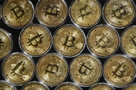 Đồng tiền kỹ thuật số Bitcoin. (Ảnh: AFP/TTXVN)