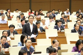 Bộ trưởng Bộ Công Thương Trần Tuấn Anh phát biểu giải trình, làm rõ một số vấn đề đại biểu Quốc hội nêu. (Ảnh: Văn Điệp/TTXVN)