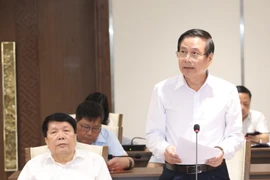 Chủ tịch Hội Văn học nghệ thuật Hà Nội Trần Quốc Chiêm đóng góp ý kiến vào Dự thảo Báo cáo chính trị. (Ảnh: Văn Điệp/TTXVN)