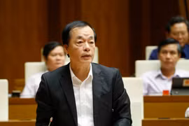 Bộ trưởng Bộ Xây dựng Phạm Hồng Hà trả lời chất vấn của các đại biểu Quốc hội. (Ảnh: Doãn Tấn/TTXVN)