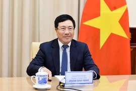 Phó Thủ tướng, Bộ trưởng Bộ Ngoại giao Phạm Bình Minh điện đàm với Bộ trưởng Ngoại giao Na Uy Ine Marie Eriksen Soreide. (Ảnh: TTXVN phát)