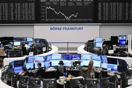 Giao dịch viên tại Sàn giao dịch chứng khoán Frankfurt, Đức. (Ảnh: THX/ TTXVN)