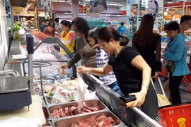 Nhu cầu thịt lợn được dự báo sẽ tăng trong ba tháng tới. (Ảnh: PV/Vietnam+)