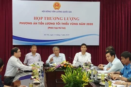 Hội đồng Tiền lương quốc gia họp bàn mức tăng lương tối thiểu vùng năm 2020. (Ảnh: PV/Vietnam+)