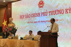 Các đại biểu tham dự phiên Họp báo Chính phủ tối 2/6. (Ảnh: Đức Duy/Vietnam+)