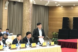Thứ trưởng Bộ Y tế Nguyên Thanh Long nói về việc kiểm soát dịch COVID-19. (Ảnh: Đức Duy/Vietnam+)