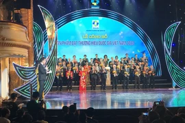 Phó Thủ tướng Trương Hòa Bình tại Lễ tôn vinh các doanh nghiệp có sản phẩm đạt Thương hiệu quốc gia năm 2020. (Ảnh: Đức Duy/Vietnam+)