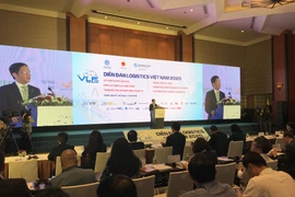 Bộ trưởng Công Thương Trần Tuấn Anh phát biểu tại diễn đàn Logistics 2020. (Ảnh: Đức Duy/Vietnam+)