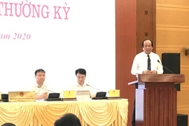 Bộ trưởng Chủ nhiệm Văn phòng Chính phủ Mai Tiến Dũng chủ trì phiên họp báo. (Ảnh: Đức Duy/Vietnam+)