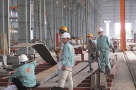Bộ Công Thương sẽ đồng hành cùng doanh nghiệp, tháo gỡ khó khăn đẩy mạnh sản xuất và xuất khẩu. (Ảnh: Đức Duy/Vietnam+)