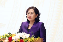 Thống đốc Nguyễn Thị Hồng phát biểu tại hội nghị Chính phủ với địa phương ngày 29/12. (Ảnh: TTXVN)