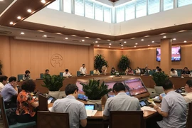 Phiên họp trực tuyến của Ban Chỉ đạo Phòng chống dịch bệnh COVID-19 Hà Nội ngày 4/9. (Ảnh: Xuân Quảng/Vietnam+)